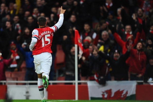 LONDON, ENGLAND - FEBRUARY 02:  Alex Oxlade-Chamberlain of Arsenal celebrates after scoring his first goal of Crystal Palace during the Barclays Premier League match between Arsenal and Crystal Palace at Emirates Stadium on February 2, 2014 in London, Eng