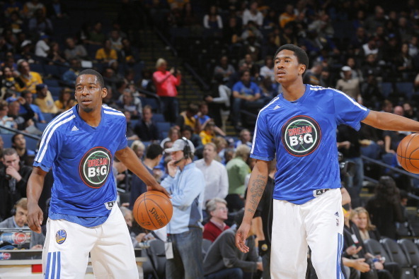 OAKLAND, CA - JANUARY 20: Jordan Crawford #55 and MarShon Brooks #2 of the Golden State Warriors warm up prior to the game against the Indiana Pacers on January 20, 2014 at Oracle Arena in Oakland, California. NOTE TO USER: User expressly acknowledges and