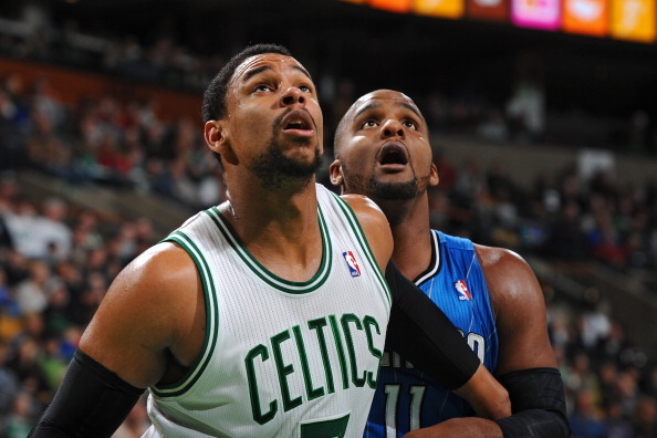 BOSTON, MA - FEBRUARY 2:  Jared Sullinger #7 of the Boston Celtics looks for the rebound against Glen Davis #11 of the Orlando Magic on February 2, 2014 at the TD Garden in Boston, Massachusetts.  NOTE TO USER: User expressly acknowledges and agrees that,