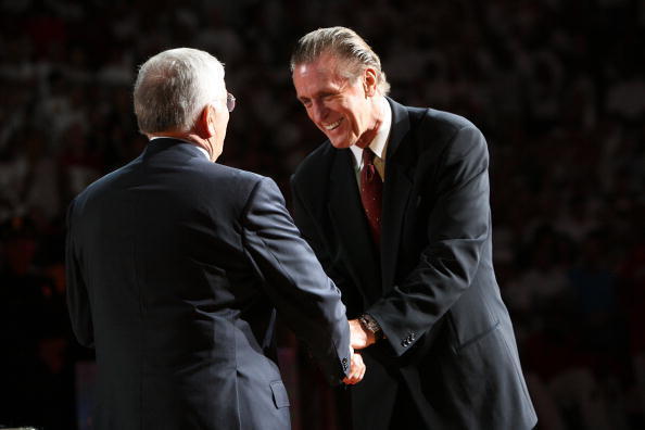 MIAMI - OCTOBER 31:  Head coach Pat Riley of the Miami Heat receives his ring from NBA Commissioner David Stern during the ring ceremony honoring the Miami Heat for winning the 2006 NBA Championship prior to the game against the Chicago Bulls on October 3