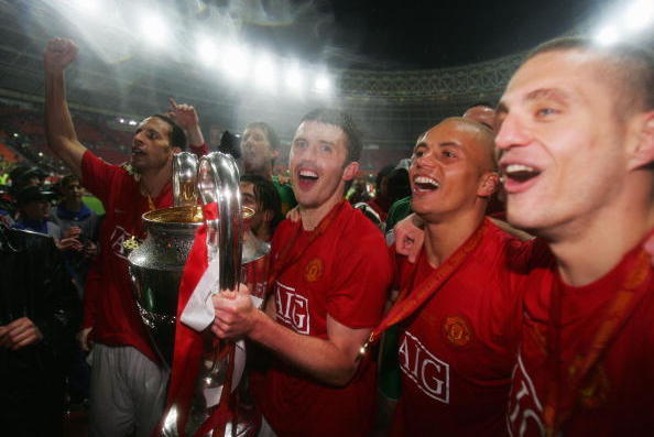 MOSCOW - MAY 21:  (L to R) Rio Ferdinand, Michael Carrick, Wes Brown and Nemanja Vidic celebrate with the trophy following their victory during the UEFA Champions League Final match between Manchester United and Chelsea at the Luzhniki Stadium on May 21, 