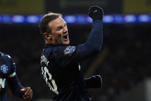 CARDIFF, WALES - NOVEMBER 24:  Manchester United player Wayne Rooney celebrates the first goal  during the Barclays Premier League match between Cardiff City and Manchester United at Cardiff City Stadium on November 24, 2013 in Cardiff, Wales.  (Photo by 