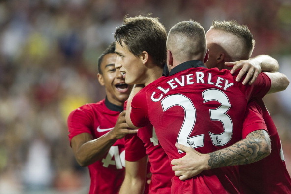 SO KON PO, HONG KONG - JULY 29:  Adnan Januzaj (C) of Manchester United celebrates his goal with team-mates Tom Cleverley, Alexander Buttner (R) and Jesse Lingard (L) during the international friendly match between Kitchee FC and Manchester United at Hong