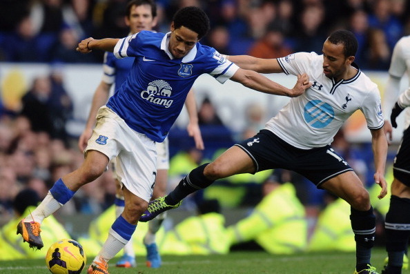LIVERPOOL, ENGLAND - NOVEMBER 03:  Steven Pienaar (L) of Everton tackled by Andros Townsend of Tottenham Hotspur during the Barclays Premier League match between Everton and Tottenham Hotspur at Goodison Park on November 3, 2013 in Liverpool, England.  (P