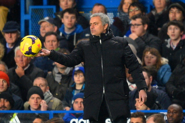 LONDON, ENGLAND - JANUARY 29:  Jose Mourinho manager of Chelsea holds the ball during the Barclays Premier League match between Chelsea and West Ham United at Stamford Bridge on January 29, 2014 in London, England.  (Photo by Mike Hewitt/Getty Images)