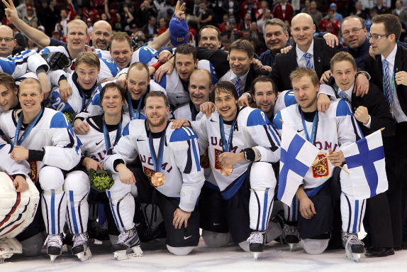 VANCOUVER, BC - FEBRUARY 27:  Team Finland celebrates with the bronze medal after the ice hockey men's bronze medal game between Finland and Slovakia on day 16 of the Vancouver 2010 Winter Olympics at Canada Hockey Place on February 27, 2010 in Vancouver,