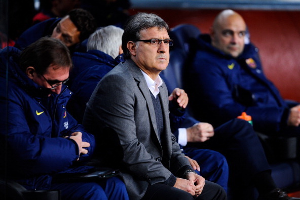 BARCELONA, SPAIN - JANUARY 26:  Head coach Gerardo 'Tata' Martino of FC Barcelona looks on from the bench during the La Liga match between FC Barcelona and Malaga CF at Camp Nou on January 26, 2014 in Barcelona, Spain.  (Photo by David Ramos/Getty Images)