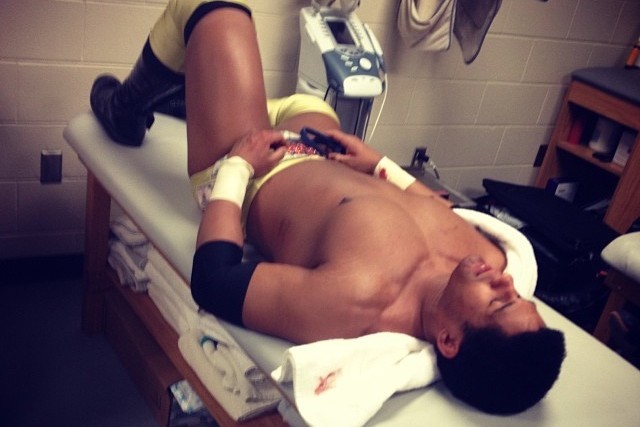 Darren Young awaits medical attention
