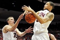 Jan 16, 2014; Tucson, AZ, USA; Arizona Wildcats center Kaleb Tarczewski (35) and forward Brandon Ashley (21) go after the rebound during the first half against the Arizona State Sun Devils at McKale Center. Mandatory Credit: Casey Sapio-USA TODAY Sports