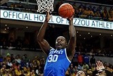 Feb 1, 2014; Columbia, MO, USA; Kentucky Wildcats forward Julius Randle (30) shoots over Missouri Tigers guard Jordan Clarkson (5) and Missouri Tigers forward Johnathan Williams, III (3) during the first half at Mizzou Arena. Mandatory Credit: Dak Dillon-