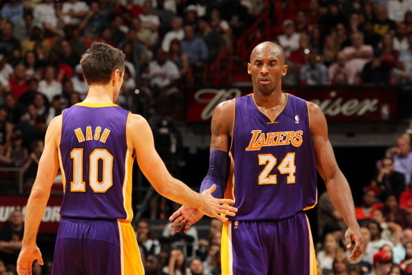MIAMI, FL - FEBRUARY 10:  Steve Nash #10 of the Los Angeles Lakers and Kobe Bryant #24 of the Los Angeles Lakers congratulate each other during a game between the Los Angeles Lakers and the Miami Heat on February 10, 2013 at American Airlines Arena in Mia