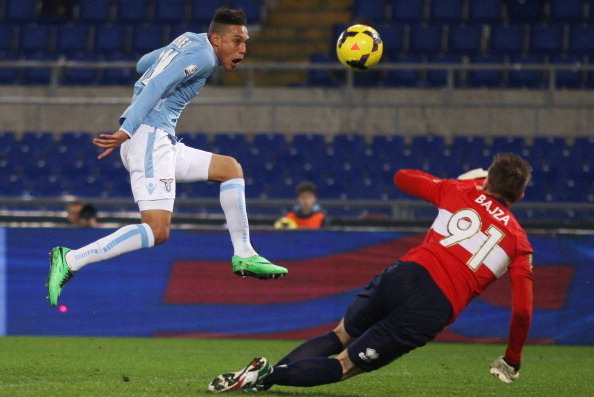 ROME, ITALY - JANUARY 14:  Brayan Perea of SS Lazio scores the opening goal during the TIM cup match between SS Lazio and Parma FC at Olimpico Stadium on January 14, 2014 in Rome, Italy.  (Photo by Paolo Bruno/Getty Images)