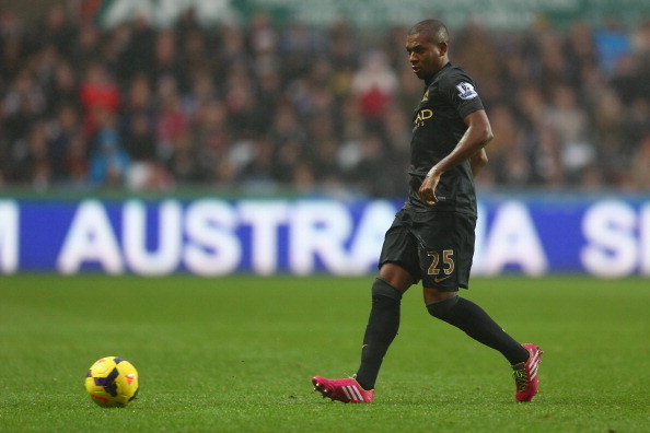 SWANSEA, WALES - JANUARY 01: Fernandinho of Manchester City during the Barclays Premier League match between Swansea City and Manchester City at the Liberty Stadium on January 1, 2014 in Swansea, Wales.  (Photo by Michael Steele/Getty Images)