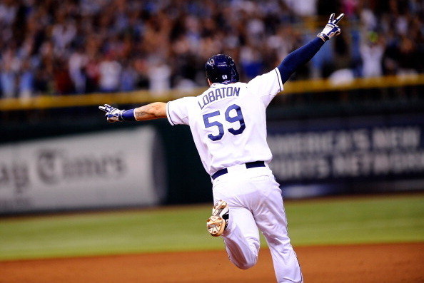 ST PETERSBURG, FL - OCTOBER 07:  Jose Lobaton #59 of the Tampa Bay Rays rounds the bases after hitting a walk off home run in the bottom of the ninth to defeat the Boston Red Sox during Game Three of the American League Division Series at Tropicana Field 