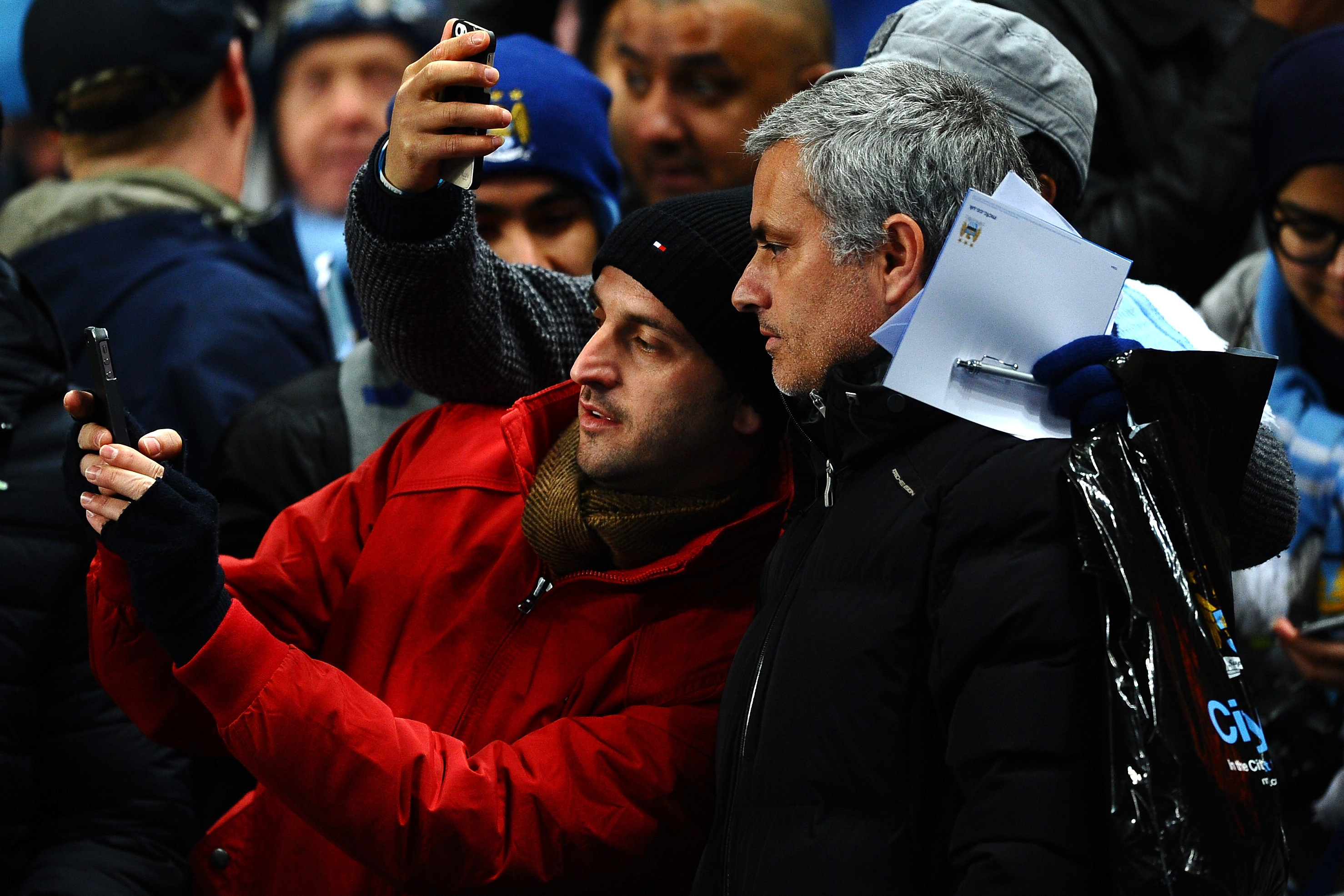 MANCHESTER, ENGLAND - FEBRUARY 03:  Jose Mourinho manager of Chelsea smlies a he poses for a photograph with fans during the Barclays Premier League match between Manchester City and Chelsea at Etihad Stadium on February 3, 2014 in Manchester, England.  (