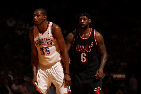 MIAMI, FL - JANUARY 29: Kevin Durant #35 of the Oklahoma City Thunder looks on against LeBron James #6 of the Miami Heat at the American Airlines Arena in Miami, Florida on Jan. 29, 2014. NOTE TO USER: User expressly acknowledges and agrees that, by downl