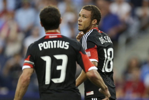 KANSAS CITY, KS - AUGUST 11: Nick DeLeon #18 of the D.C. United celebrates his goal with Chris Pontius #13 during a game against the Sporting Kansas City in the first half at Livestrong Sporting Park on August 11, 2012 in Kansas City, Kansas. (Photo by Ed