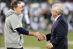Nov 22, 2012; East Rutherford, NJ, USA; New England Patriots head coach Bill Belichick (left) greets team owner Robert Kraft before the game against the New York Jets on Thanksgiving at Metlife Stadium.  Mandatory Credit: Joe Camporeale-USA TODAY Sports