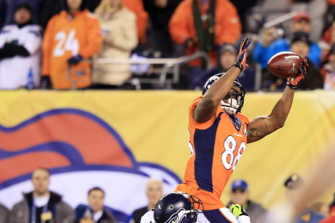 EAST RUTHERFORD, NJ - FEBRUARY 02:  Cornerback Byron Maxwell #41 of the Seattle Seahawks tackles wide receiver Demaryius Thomas #88 of the Denver Broncos during Super Bowl XLVIII at MetLife Stadium on February 2, 2014 in East Rutherford, New Jersey. The S