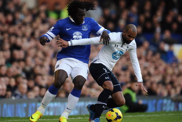 LIVERPOOL, ENGLAND - NOVEMBER 03:  Romelu Lukaku (L) of Everton tackles Sandro of Tottenham Hotspur during the Barclays Premier League match between Everton and Tottenham Hotspur at Goodison Park on November 3, 2013 in Liverpool, England.  (Photo by Tony 