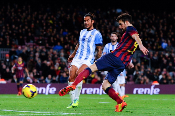 BARCELONA, SPAIN - JANUARY 26:  Cesc Fabregas of FC Barcelona shoots towards goal during the La Liga match between FC Barcelona and Malaga CF at Camp Nou on January 26, 2014 in Barcelona, Spain.  (Photo by David Ramos/Getty Images)
