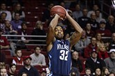 Feb 1, 2014; Philadelphia, PA, USA; Villanova Wildcats guard James Bell (32) shoots a jump shot during the first half against the Temple Owls at the Liacouras Center. Mandatory Credit: Howard Smith-USA TODAY Sports