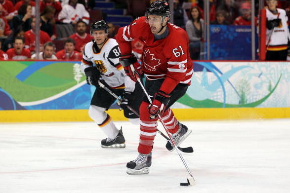 VANCOUVER, BC - FEBRUARY 23:  Rick Nash #61 of Canada handles the puck during the ice hockey Men's Qualification Playoff game between Germany and Canada on day 12 of the Vancouver 2010 Winter Olympics at UBC Thunderbird Arena on February 23, 2010 in Vanco