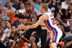 Feb 3, 2014; Miami, FL, USA; Miami Heat small forward LeBron James (6) is pressured by Detroit Pistons small forward Kyle Singler (25) during the first half at American Airlines Arena. Mandatory Credit: Steve Mitchell-USA TODAY Sports