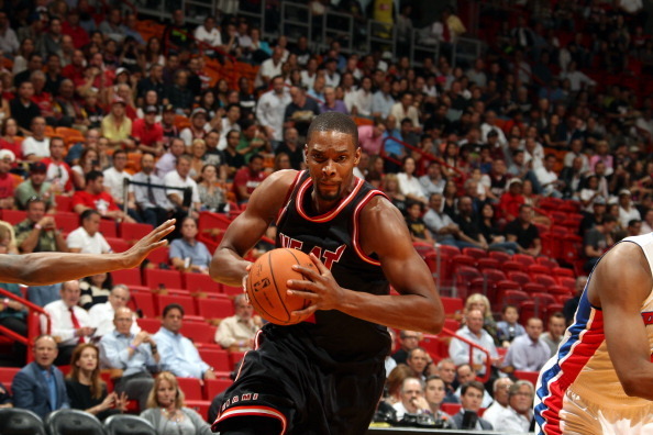 MIAMI, FL - FEBRUARY 3:  Chris Bosh #1 of the Miami Heat handles the ball against the Detroit Pistons at the American Airlines Arena in Miami, Florida on February 3, 2014. NOTE TO USER: User expressly acknowledges and agrees that, by downloading and/or us