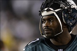 Dec 22, 2013; Philadelphia, PA, USA; Philadelphia Eagles quarterback Michael Vick (7) along the sidelines during the fourth quarter against the Chicago Bears at Lincoln Financial Field. The Eagles defeated the Bears 54-11. Mandatory Credit: Howard Smith-U