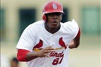 Mar 19, 2013; Jupiter, FL, USA; St. Louis Cardinals center fielder Oscar Taveras (87) rounds third base and scores a run in the fourth inning during a spring training game against the Miami Marlins at Roger Dean Stadium. Mandatory Credit: Steve Mitchell-U