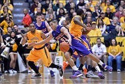 Feb 1, 2014; Wichita, KS, USA; Evansville Aces guard D.J. Balentine (31) drives against pressure from the Wichita State Shockers during the second half at Charles Koch Arena. The Shockers won 81-67. Mandatory Credit: Peter G. Aiken-USA TODAY Sports