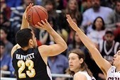 Mar 23, 2013; Salt Lake City, UT, USA; Wichita State Shockers guard Fred Van Vleet (23) hits a three point shot over Gonzaga Bulldogs guard David Stockton (11) late in the second half of the game during the third round of the NCAA basketball tournament at