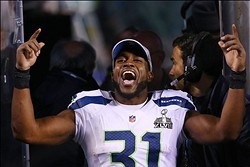 Feb 2, 2014; East Rutherford, NJ, USA; Seattle Seahawks strong safety Kam Chancellor (31) celebrates winning Super Bowl XLVIII at MetLife Stadium.  Mandatory Credit: Ed Mulholland-USA TODAY Sports