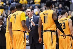 Feb 1, 2014; Wichita, KS, USA; Wichita State Shockers head coach Gregg Marshall talks with guard Derail Green (1) against the Evansville Aces during the second half at Charles Koch Arena. The Shockers won 81-67.  Mandatory Credit: Peter G. Aiken-USA TODAY