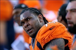 Jan 19, 2014; Denver, CO, USA; Denver Broncos offensive tackle Orlando Franklin (74) against the New England Patriots during the 2013 AFC Championship football game at Sports Authority Field at Mile High. Mandatory Credit: Mark J. Rebilas-USA TODAY Sports