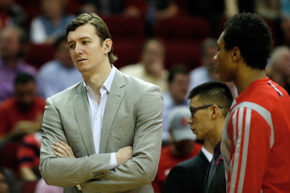 HOUSTON, TX - DECEMBER 18:   Omer Asik #3 of the Houston Rockets waits near the bench before the game against the Chicago Bulls at Toyota Center on December 18, 2013 in Houston, Texas. NOTE TO USER: User expressly acknowledges and agrees that, by download