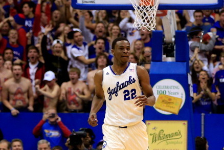 LAWRENCE, KS - JANUARY 29:  Andrew Wiggins #22 of the Kansas Jayhawks reacts after a dunk during the game against the Iowa State Cyclones at Allen Fieldhouse on January 29, 2014 in Lawrence, Kansas.  (Photo by Jamie Squire/Getty Images)