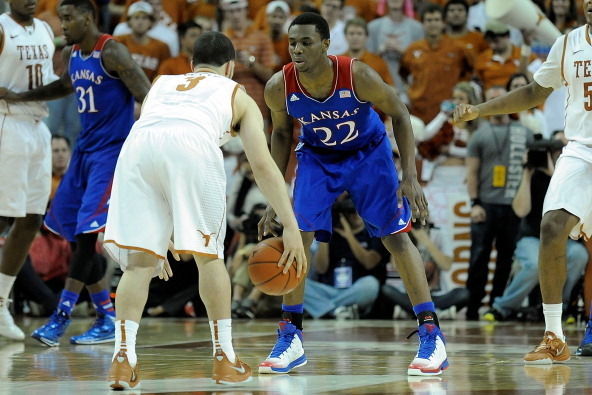 AUSTIN, TX - FEBRUARY 01:  Andrew Wiggins #22 of the Kansas Jayhawks defends Javan Felix #3 of the Texas Longhorns during a game at The Frank Erwin Center on February 1, 2014 in Austin, Texas.  Texas won the game 81-69.  (Photo by Stacy Revere/Getty Image