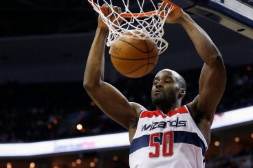 WASHINGTON, DC - APRIL 02: Emeka Okafor #50 of the Washington Wizards dunks in front of Nazr Mohammed #48 of the Chicago Bulls during the second half of the during the Wizards 90-86 win at Verizon Center on April 2, 2013 in Washington, DC. NOTE TO USER: U