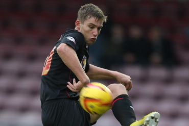 NORTHAMPTON, ENGLAND - NOVEMBER 16:  Charlie Taylor of Fleetwood Town in action during the Sky Bet League Two match between Northampton Town and Fleetwood Town at Sixfields Stadium on November 16, 2013 in Northampton, England.  (Photo by Pete Norton/Getty