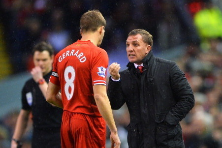 LIVERPOOL, ENGLAND - JANUARY 18: Brendan Rodgers, manager of Liverpool talks to Steven Gerrard during the Barclays Premier League match between Liverpool and Aston Villa at Anfield on January 18, 2014 in Liverpool, England.  (Photo by Michael Regan/Getty 