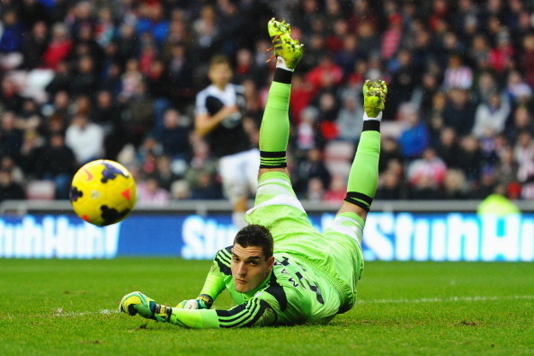 SUNDERLAND, ENGLAND - JANUARY 18:  Vito Mannone of Sunderland makes a save during the Barclays Premier League match between Sunderland and Southampton at Stadium of Light on January 18, 2014 in Sunderland, England.  (Photo by Laurence Griffiths/Getty Imag
