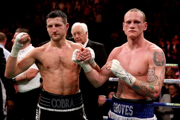 MANCHESTER, ENGLAND - NOVEMBER 23:  Carl Froch shakes hands with George Groves during their IBF and WBA World Super Middleweight bout at Phones4u Arena on November 23, 2013 in Manchester, England.  (Photo by Scott Heavey/Getty Images)