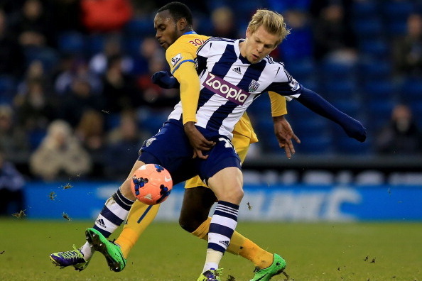 WEST BROMWICH, ENGLAND - JANUARY 04:  Matej Vydra of West Brom is tackled by Hiram Boateng of Palace during the Budweiser FA Cup third round match between West Bromwich Albion and Crystal Palace at The Hawthorns on January 4, 2014 in West Bromwich, Englan