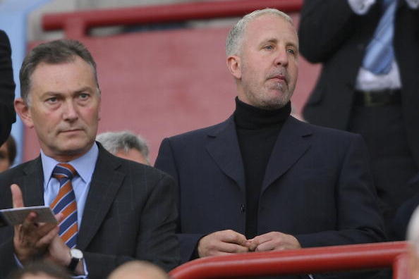 BIRMINGHAM, UNITED KINGDOM - OCTOBER 14:  Villa chairman Randy Lerner (r) takes his seat during the Barclays Premiership match between Aston villa and Tottenham Hotspur at Villa Park on October 14, 2006 in Birmingham, England.  (Photo by Stu Forster/Getty