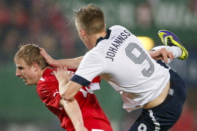 VIENNA, AUSTRIA - NOVEMBER 19: Martin Hinteregger of Austria (L) and Aron Johannsson of USA in action during the International friendly match between Austria and USA at the Ernst-Happel Stadium on November 19, 2013 in Vienna, Austria. (Photo by Christian 