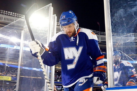 NEW YORK, NY - JANUARY 29:  (EDITORIAL USE ONLY)  Thomas Vanek #26 of the New York Islanders takes the ice to play against the New York Rangers during the 2014 Coors Light NHL Stadium Series at Yankee Stadium on January 29, 2014 in the Bronx borough of Ne