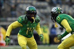 Nov 29, 2013; Eugene, OR, USA; Oregon Ducks cornerback Ifo Ekpre-Olomu (14) and defensive back Juwaan Williams (17) running pre game routes against the Oregon State Beavers at Matthew Knight Arena. Mandatory Credit: Scott Olmos-USA TODAY Sports
