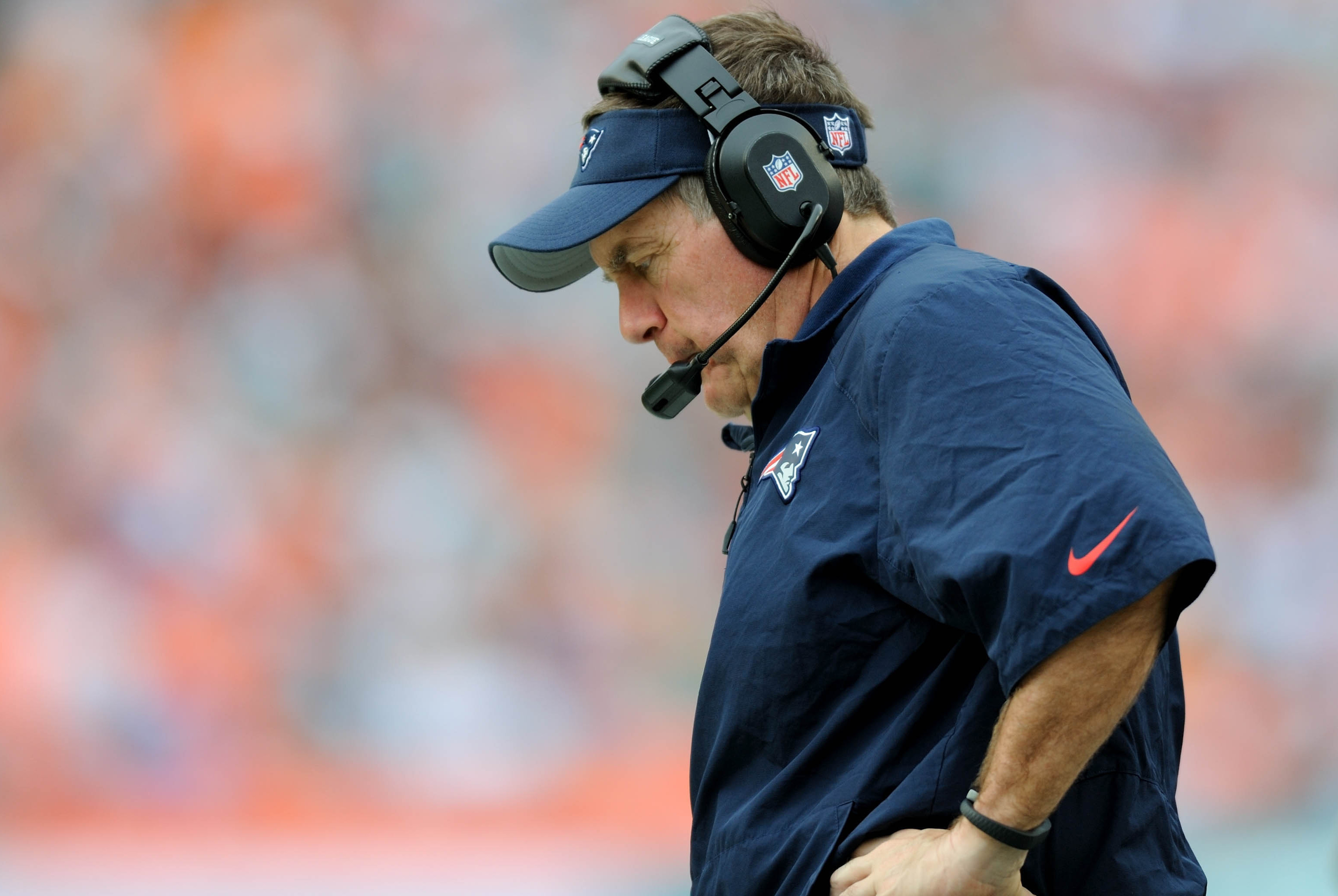 Dec 15, 2013; Miami Gardens, FL, New England Patriots head coach Bill Belichick looks on from the sideline during the second half against the Miami Dolphins at Sun Life Stadium. The Dolphins won 24-20. Mandatory Credit: Steve Mitchell-USA TODAY Sports